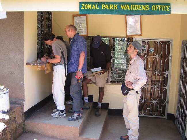 Paying the park fees: $1900 for 4 tourists and 20 Tanzanians